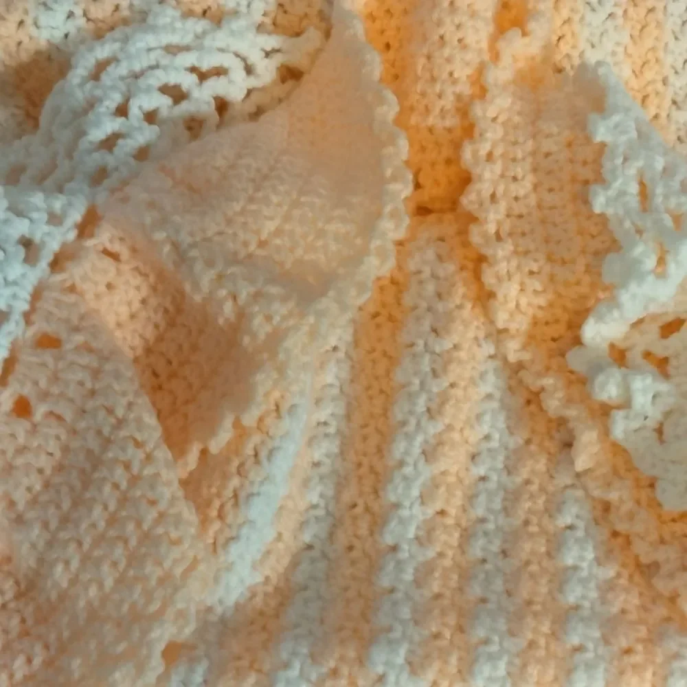 Never used.  ( my mom) homemade baby 🐥 blanket